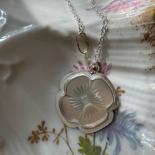 Antique Mother of Pearl Flower Pendant Set in Sterling Silver on a Silver Chain with an 18 Karat Gold Oval