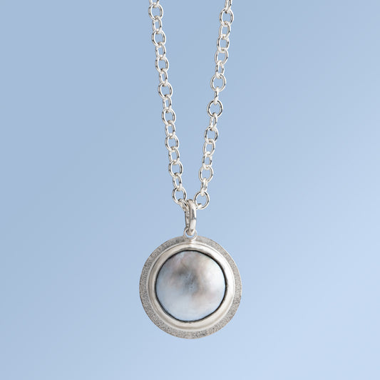 Mabe Pearl Pendant Set in Sterling Silver on a Silver Chain