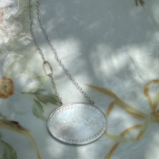 Antique Mother of Pearl Pendant Set in Sterling Silver on a Silver Chain with an 18 Karat Gold Oval