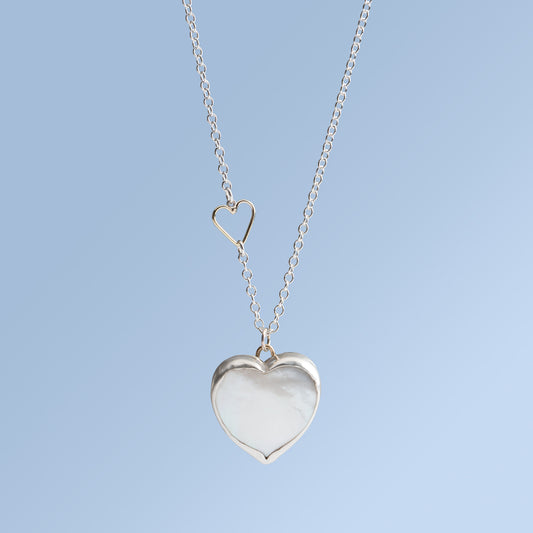 Mother of Pearl Heart Set in Sterling Silver on a Sterling Silver Chain with an 18 Karat Gold Heart Link