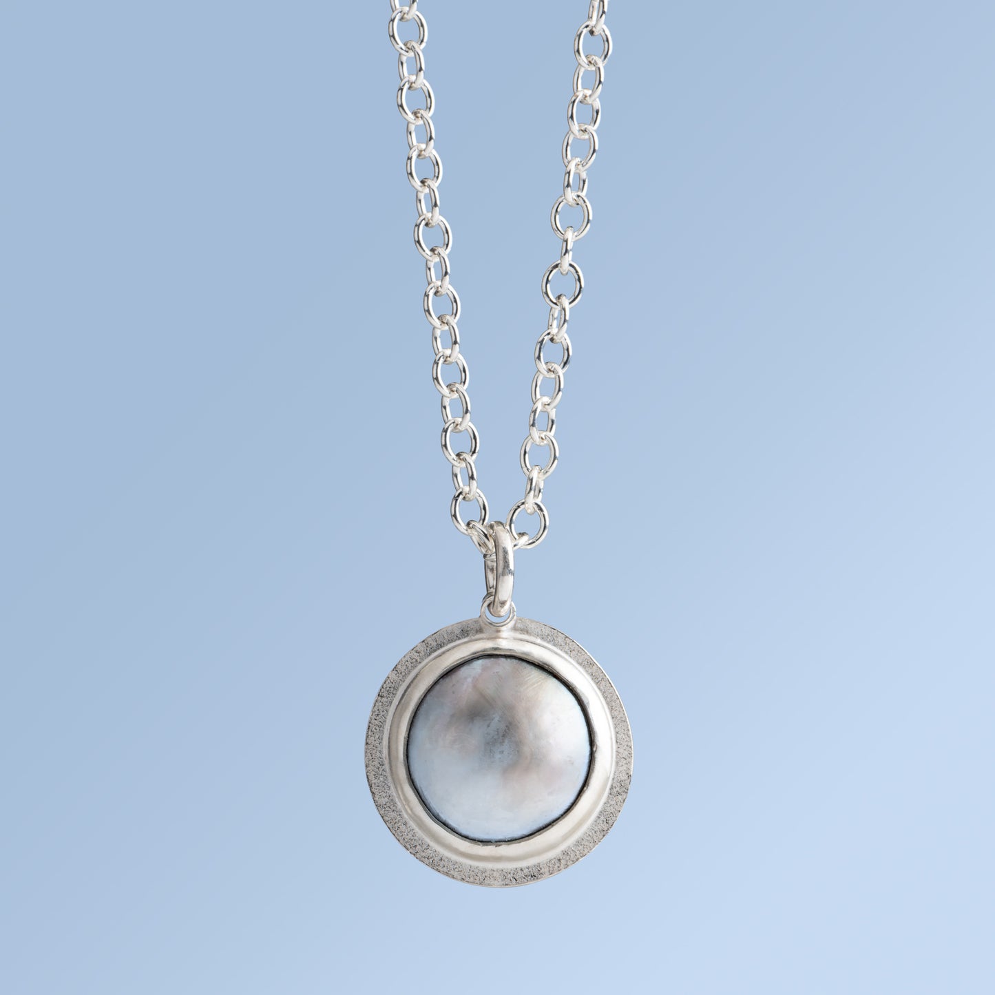 Mabe Pearl Pendant Set in Sterling Silver on a Silver Chain