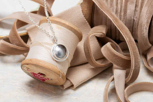 Mabe Pearl Pendant Set in Sterling Silver on a Silver Chain