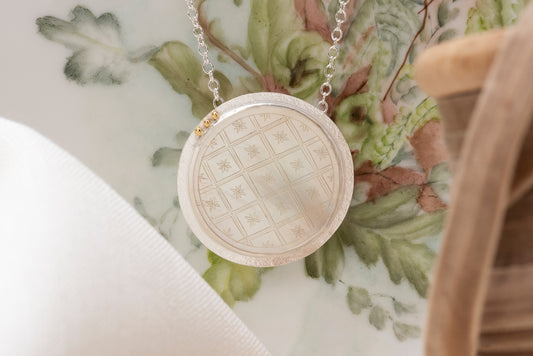 Antique Mother of Pearl Pendant Set in Sterling Silver on a Silver Chain with Three 18 Karat Gold Beads